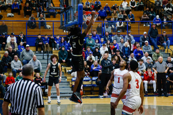 Link Academy's Jasper Johnson throws down a dunk